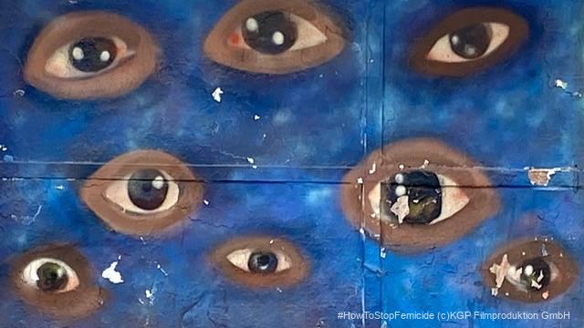 mehrere Augen auf einem blauen Hintergrund